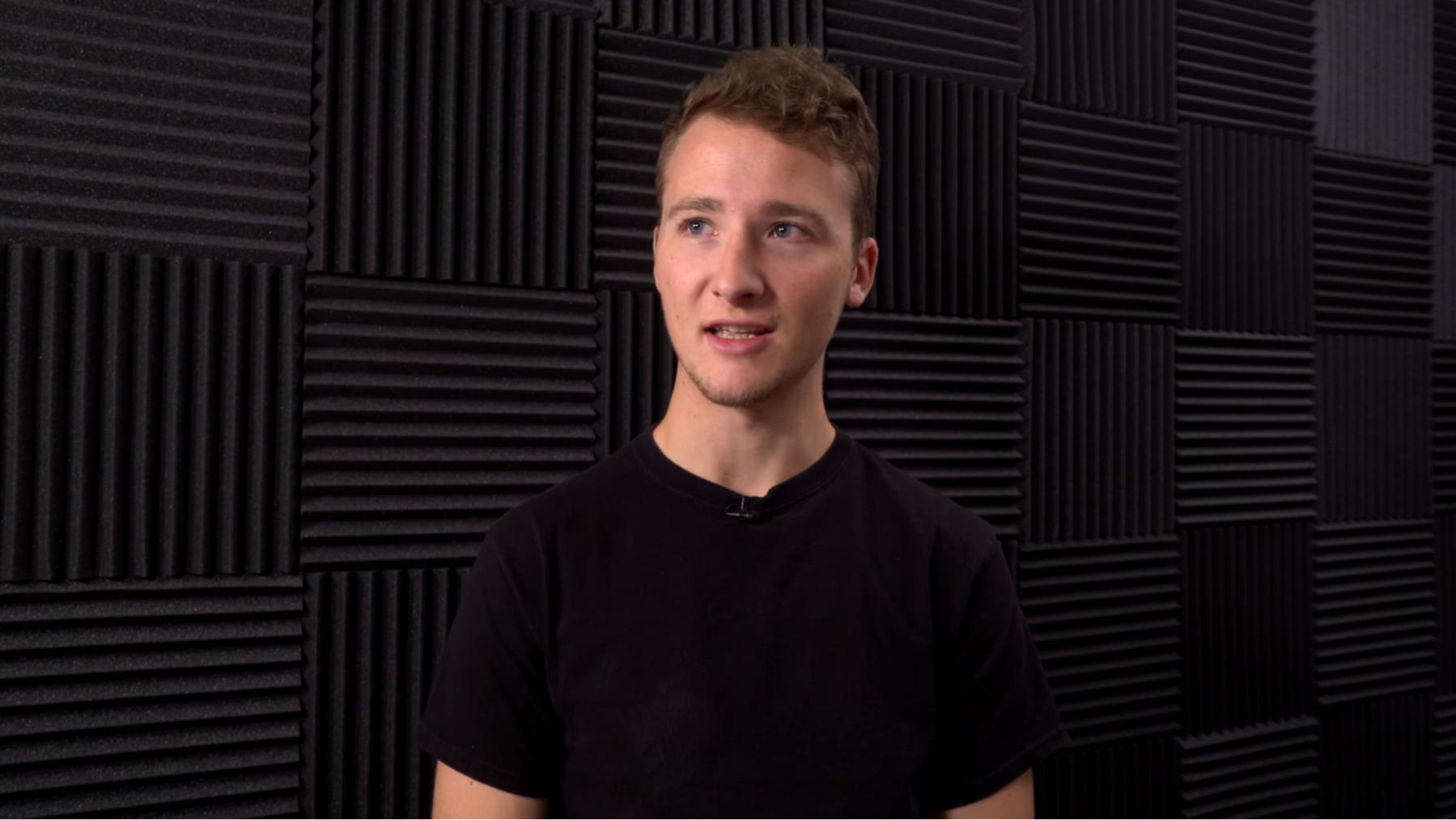 video recording studio - image of a men, that's an example of acoustic foam panels as background