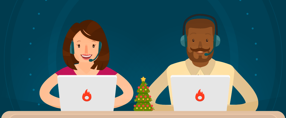 navidad - imagen de dos personas con headphones que usan el ordenador