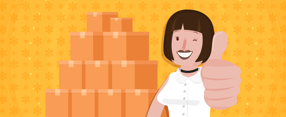 Christmas - image of a woman with her thumb up and behind her there are a bunch of boxes 