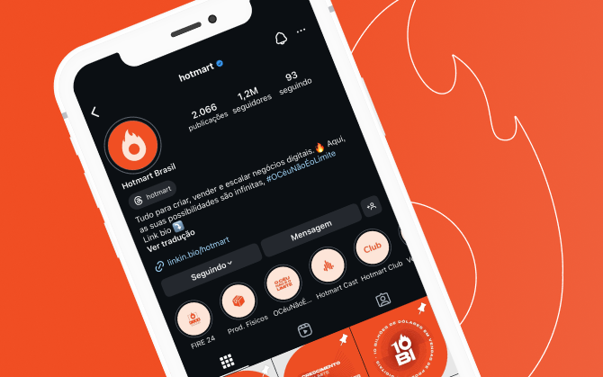 imagem de um celular com a página do Instagram da Hotmart aberta. O fundo é laranja com o logo da Hotmart em branco